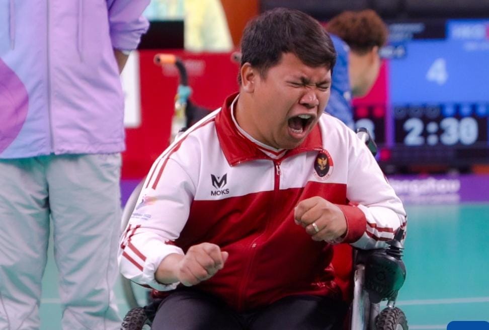 Yudha meluapkan emosinya setelah pertarungan sengit dalam memperebutkan emas melawan atlet Malaysia (sumber foto npcindonesia)