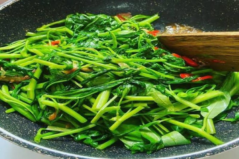 Ilustrasi tumis kangkung.(Google/@fimela.com)