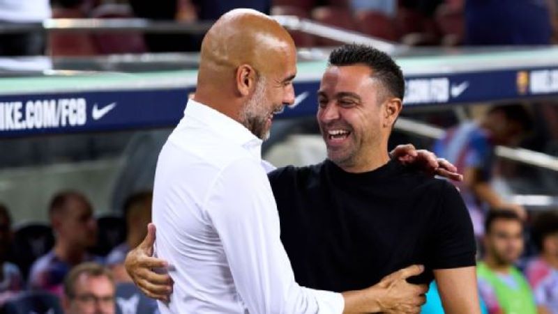 Pep Guardiola pernah latih Xavi selama empat musim di Barcelona (Alex Caparros/Getty Images)