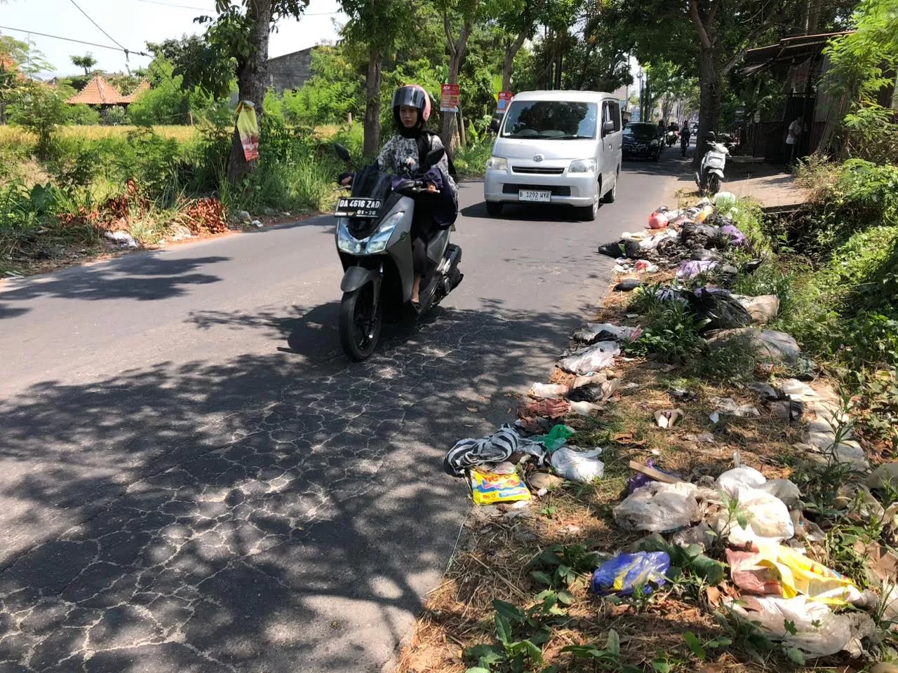 KOTOR: lustrasi tumpukan sampah di jalan Kabupaten Sleman.