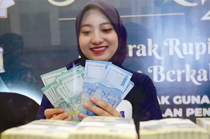 Ilustrasi pembayaran tunjangan hari raya. (Dokumen Jawa Pos)