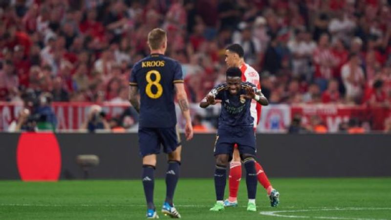 DUO: Vinicius Junior rayakan gol yang dia cetak ke gawang Bayern Munich bersama sang pengumpan, Toni Kroos (GETTYIMAGES)