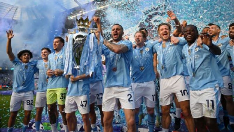 Manchester City rayakan juara Liga Inggris setelah kalahkan West Ham di Etihad Stadium ( Michael Regan/Getty Images)