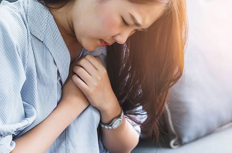 Ilustrasi seseornag yang menghirup Co2