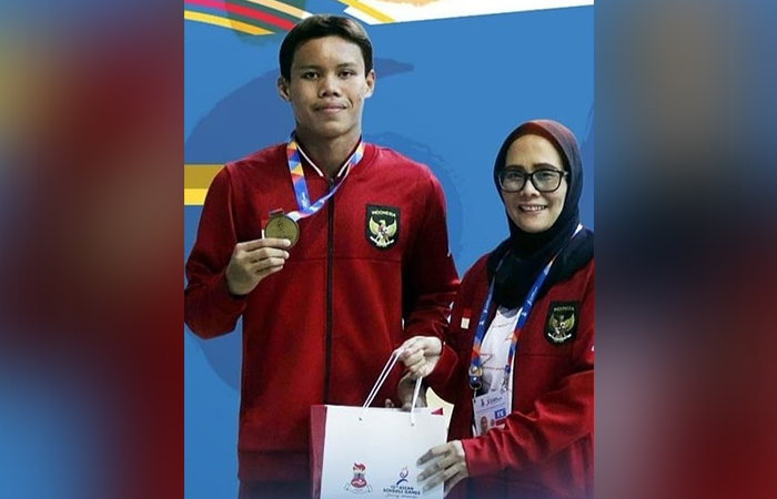 BIKIN BANGGA: Arya Adrean Putra Haryono (kiri) mengukir prestasi gemilang di ASEAN Schools Games (ASG) 2024 Da Nang, Vietnam.