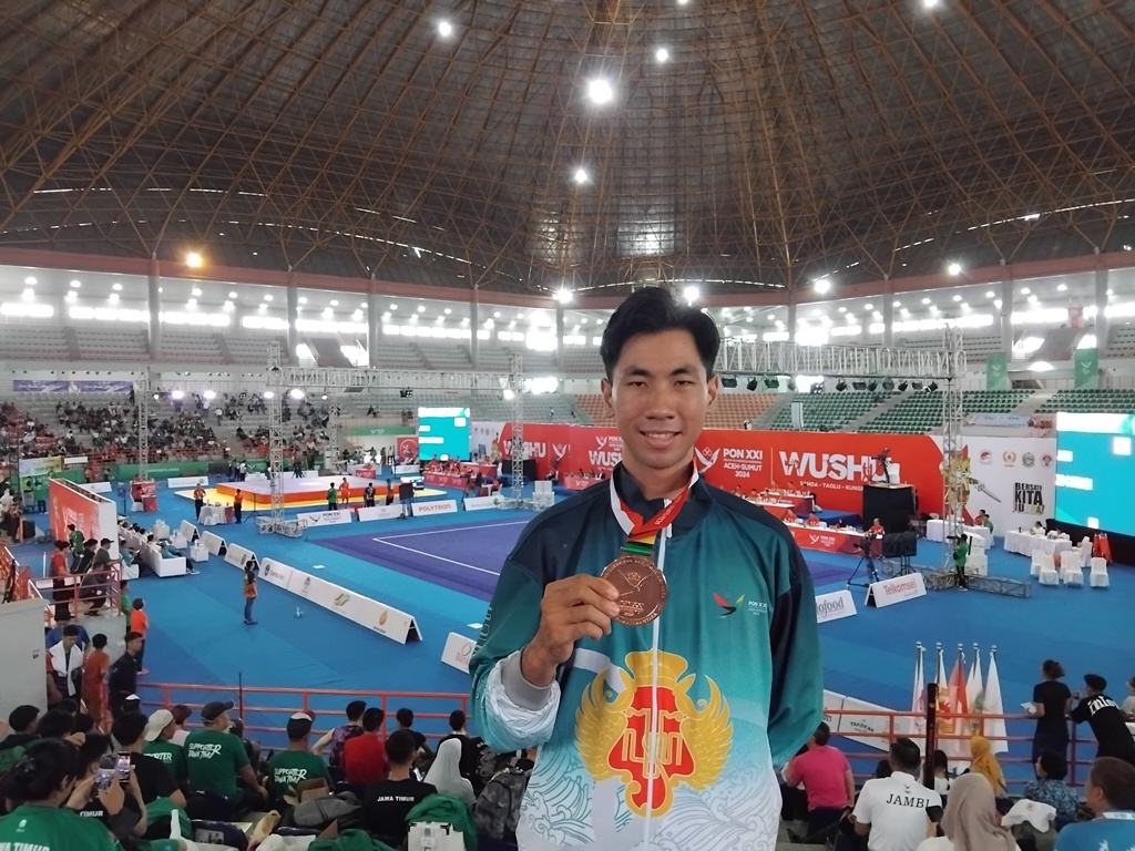 Juan Hendy Irmanto meraih medali perunggu dari cabor wushu PON XXI Aceh Sumut 2024