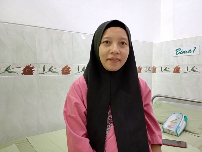 Reni (32), Ibu Rumah Tangga (IRT) warga Kapanewon Maguwoharjo, Sleman, merasakan manfaat Program Jaminan Kesehatan Nasional (JKN)