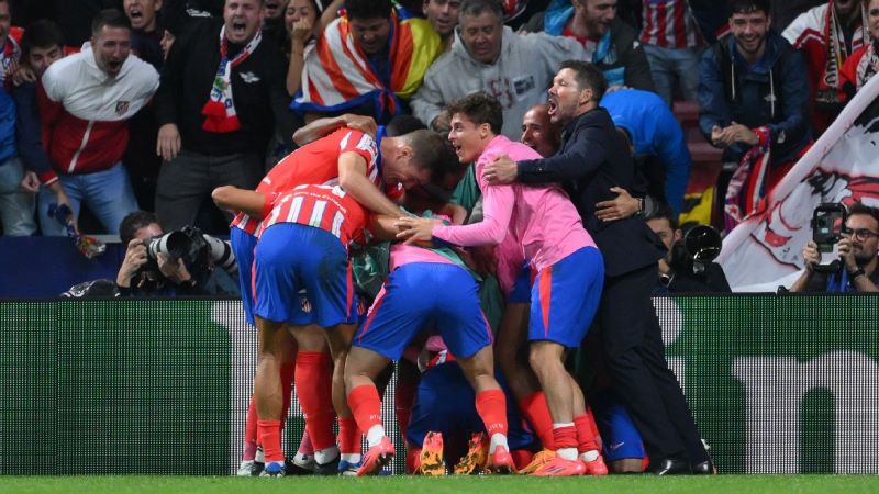 Selebrasi penggawa Atletico Madrid usai cetak gol untuk meraih tiga poin perdana di Liga Champions (getty images)