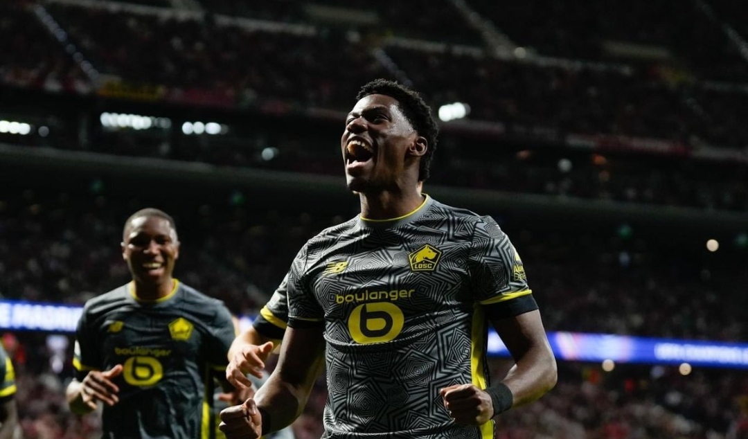 Selebrasi Jonathan David usai mencetak dua gol bagi Lille dalam kemenangan atas Atletico Madrid