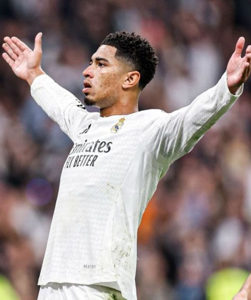 Pemain Real Madrid Jude Bellingham selebrasi saat mencetak gol melawan getafe di stadion Santiago Bernabeu, Minggu (1/12/2024) malam WIB.