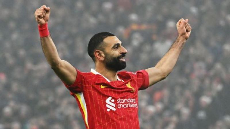 Selebrasi Mohamed Salah setelah mencetak gol ketiga Liverpool ke gawang Leicester City