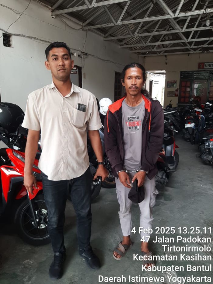 TERANCAM 15 TAHUN PENJARA: Tampang Agus Prasetyo, 39, pembunuh istrinya Watiyem saat diringkus polisi.