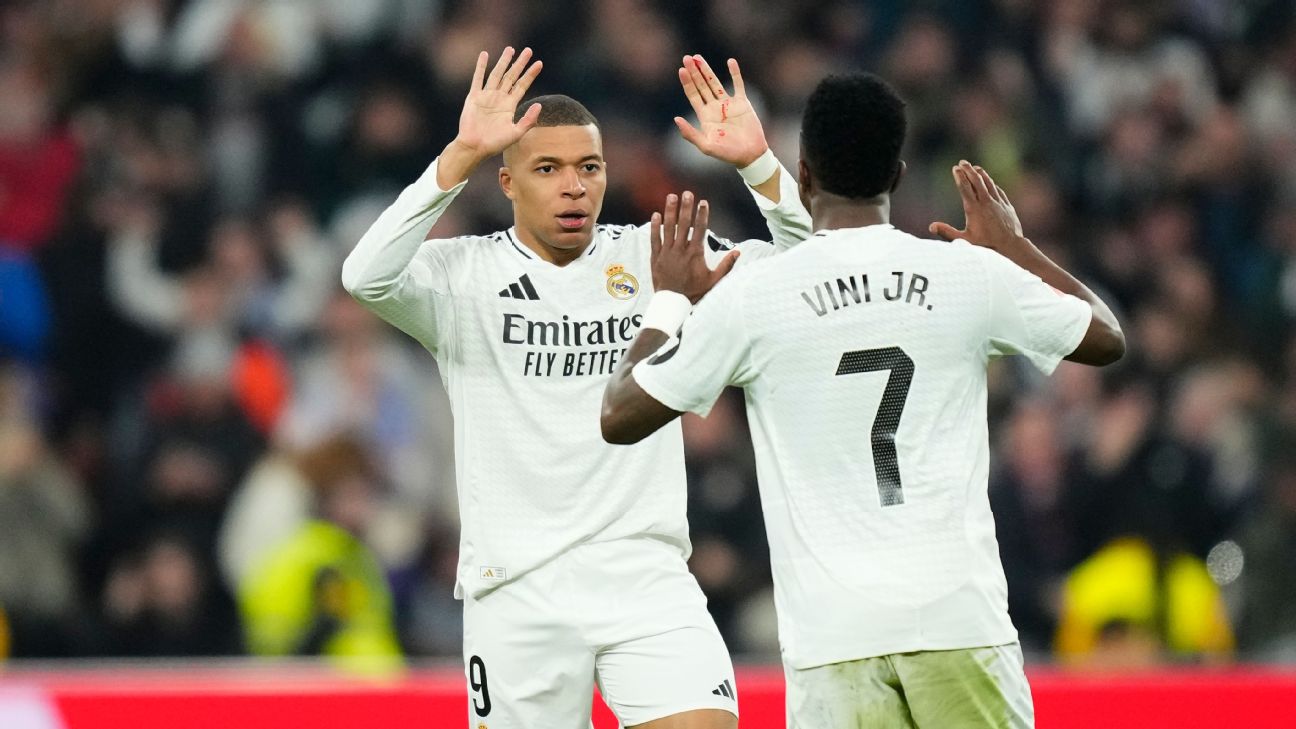 Selebrasi Kylian Mbappe rayakan gol ke gawang Atletico Madrid dalam hasil imbang 1-1 Real Madrid di Santiago Bernabeu bersama Vinicius Junior