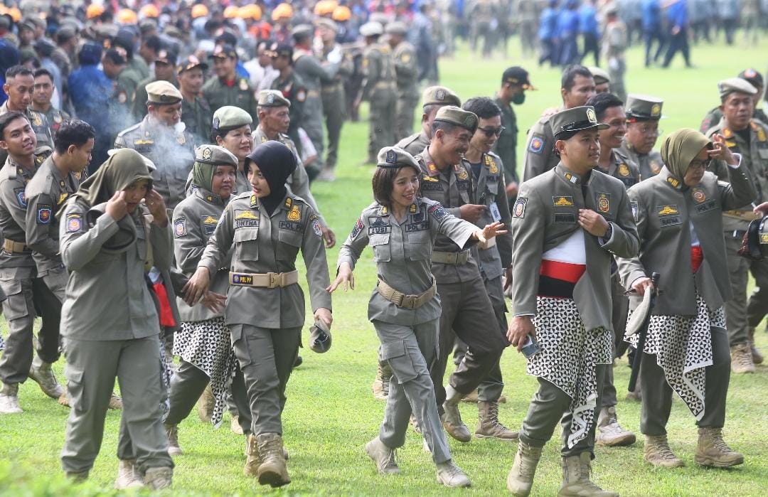 Personel Satpol PP Kota Jogja mengikuti upacara peringatan HUT Satpol PP di halaman Balai Kota Jogja, Rabu (28/5/2025).