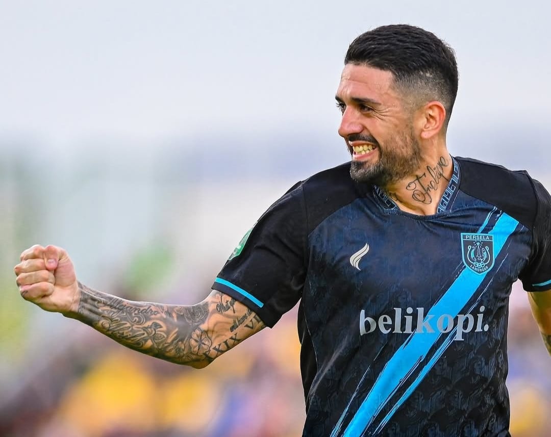 Selebrasi Jonathan Bustos setelah mencetak gol kemenangan Persela Lamongan atas PS Barito Putera di Pegadaian Championship