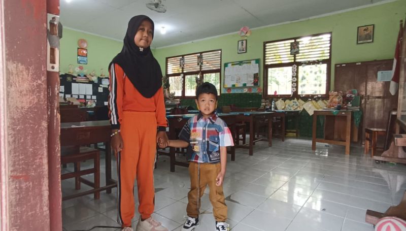 Ariendra Ralea (9) dan adiknya, Reyfan Elcaraka (3).