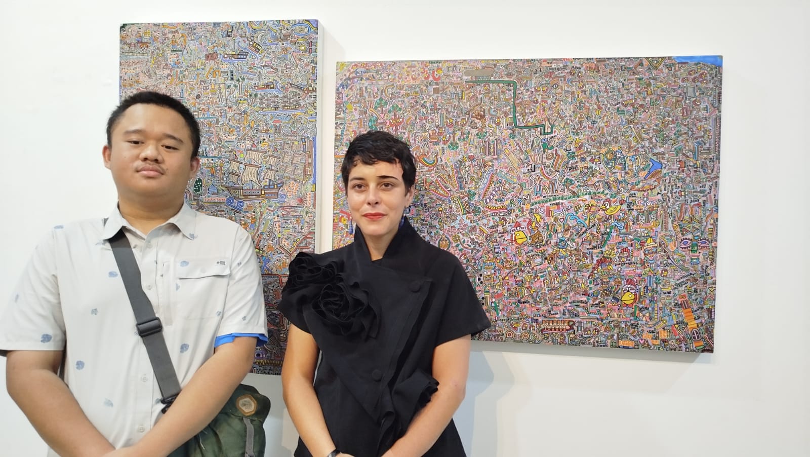 Igo Rizqullah (kiri) dan Direktur IFI Yogyakarta, Margaux Nemmouchi saat pembukaan pameran tunggal ROAD TO IGO, di IFI Yogyakarta (16/2/2026).