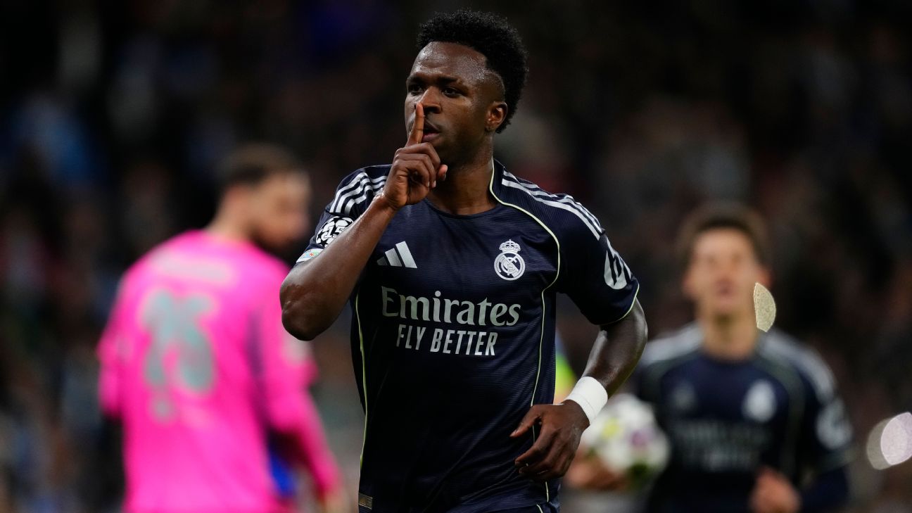 Selebrasi Vinicius Junior setelah menetak gol kemenangan Real Madrid atas Manchester City di Liga Champions
