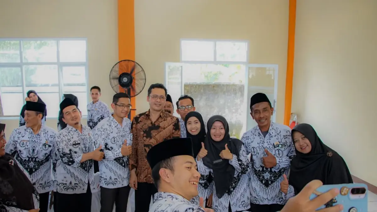 Bupati saat menghadiri acara halalbihalal dan Sinergi Advokasi Guru 2026 bersama PGRI Kabupaten Magelang di Gedung Graha Dwija PGRI, Muntilan, Sabtu (11/4).