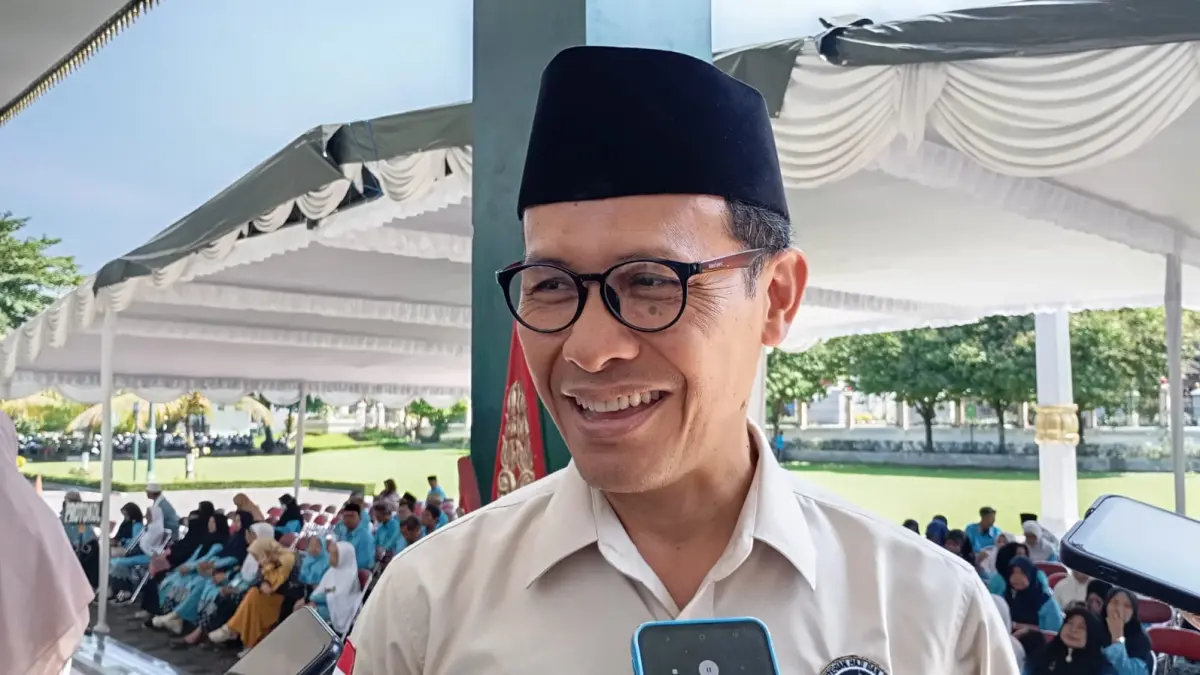 SIAP HAJI: Kasubag Tata Usaha Kementerian Agama (Kemenag) Kota Jogja Ahmad Mustafid saat ditemui di Balai Kota Jogja, Kamis (16/4/2026). (IWAN NURWANTO/Radar Jogja)

