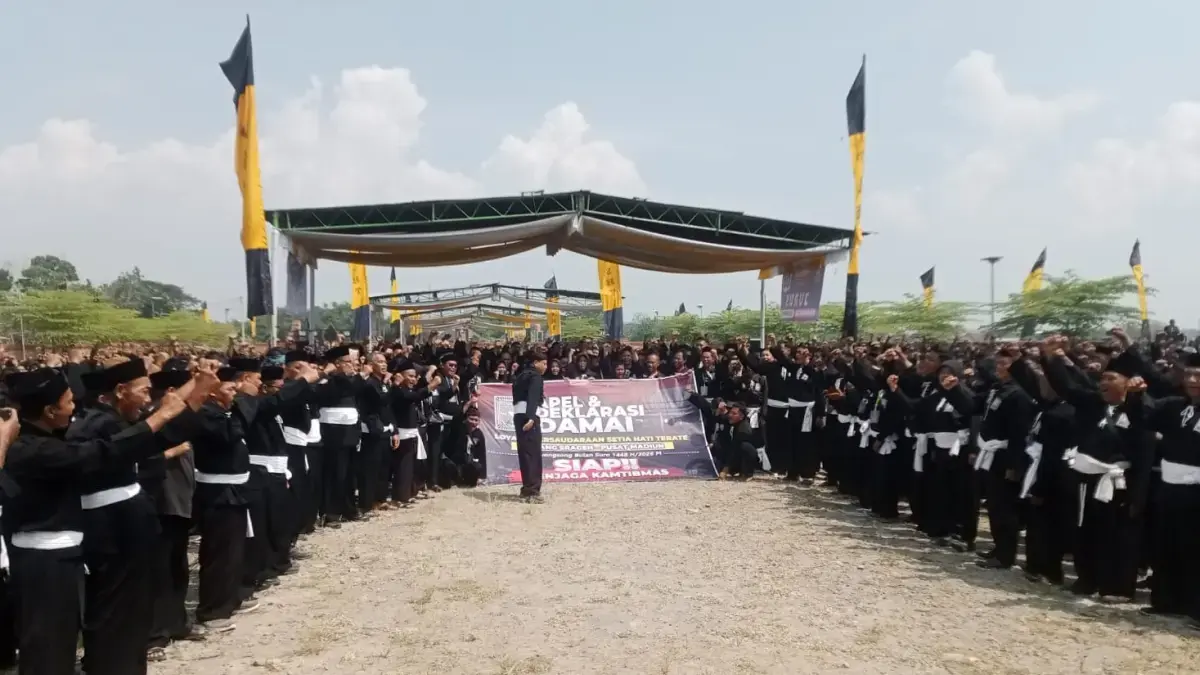 Ribuan warga PSHT Cabang Sragen Pusat Madiun ikrar damai di Padepokan Cabang di Desa Patihan, Kecamatan Sidoharjo, Sragen, Minggu (24/5).  ISTIMEWA
