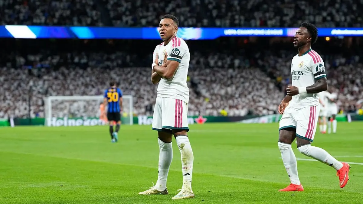 Selebrasi Kylian Mbappe setelah mencetak gol dalam kemenangan Real Madrid atas Inter Milan di laga pembuka Liga Champions.