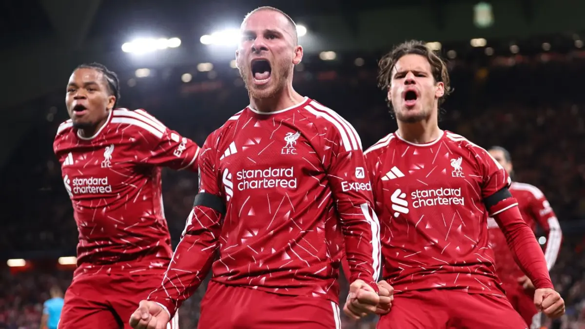 Selebrasi para pemain Liverpool setelah Alexis Mac Allister mencetak gol kemenangan atas Atletico Madrid di Liga Champions.