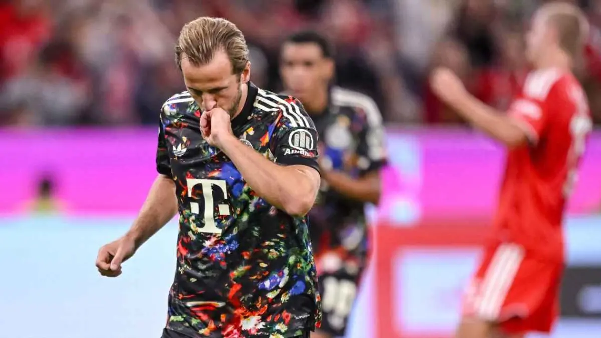 Selebrasi Harry Kane saat mencetak gol ke-100nya di Bundesliga bersama Bayern Munich.