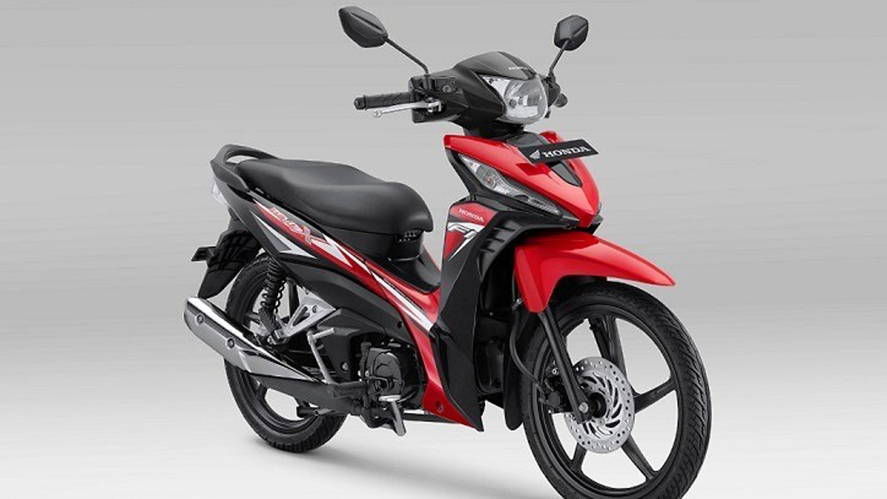 TAMPIL BARU: PT Astra Honda Motor (AHM) menghadirkan penyegaran tampilan terbaru pada sepeda motor Honda Revo melalui perubahan desain stripe yang semakin menambah kesan agresif. (HONDA FOR RADAR JOGJA)