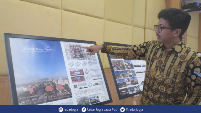 KEARIFAN LOKAL : Perwakilan kelompok Studi Arsitektur Kolektif Haidar Majid Dinutanayo menunjukkan desain penataan Jogja Planning Gallery, Senin (12/7). (DWI AGUS/RADAR JOGJA)