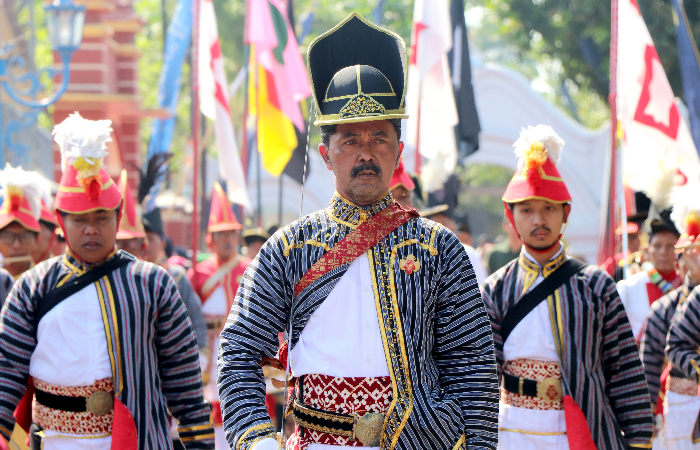 MERIAH: Pawai budaya  di Perdikan Tawangsari  yang diikuti warga  setempat menjadi agenda  rutin tahunan untuk  mengingat sejarah.