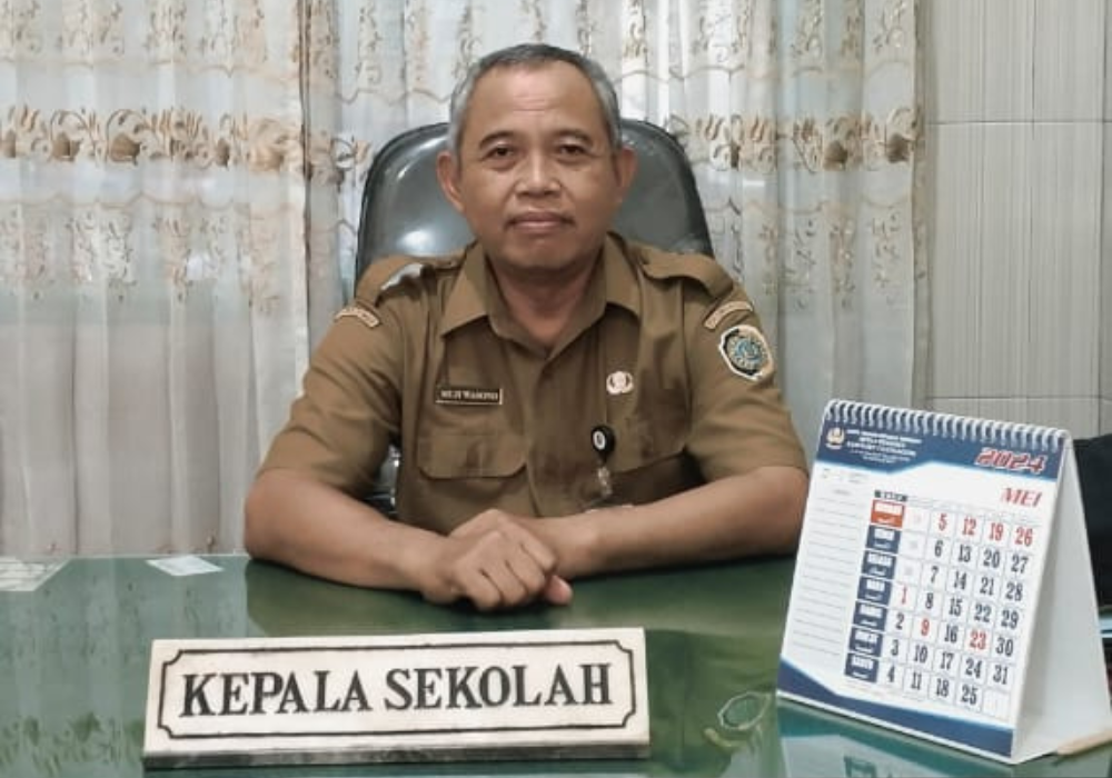 Muji Wasono, Kepala SMPN 6 Tulungagung miliki kesuksesan yang tidak semudah seperti membalikkan telapak tangan.