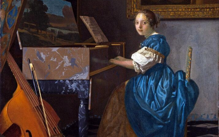 he young woman seated at a virginals by vermeer