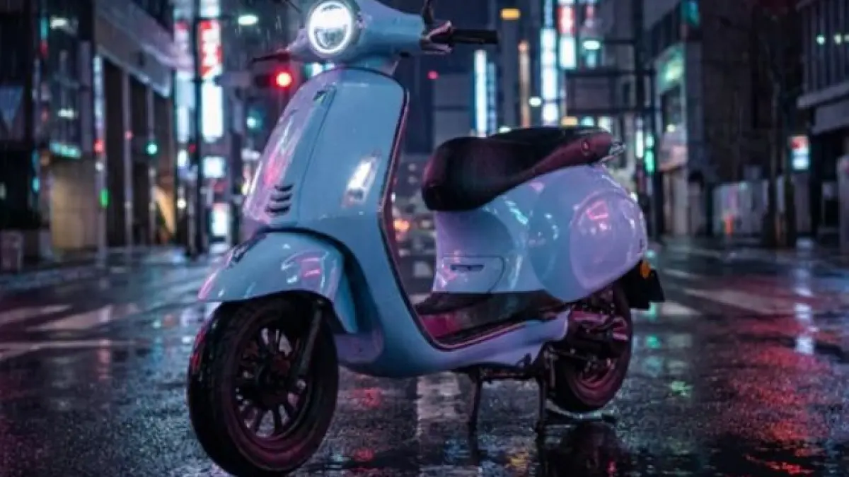Indomobil E-Motor QT resmi rilis! Motor listrik Rp 15 juta tanpa biaya sewa baterai. Desain retro, fitur NFC & purna jual terjamin. Cek speknya!