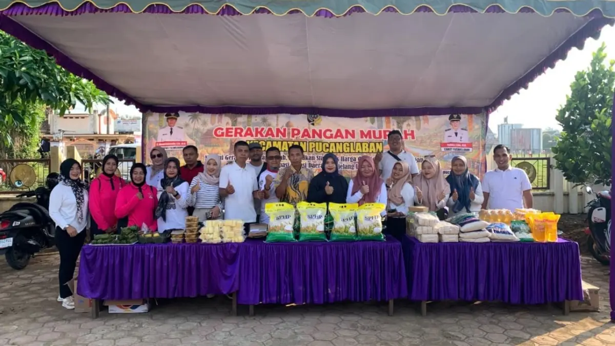 Foto bersama kegiatan Gerakan Pangan Murah yang digelar oleh Pemerintah Kecamatan Pucanglaban, Tulungagung, pada 21-22 Mei 2026.