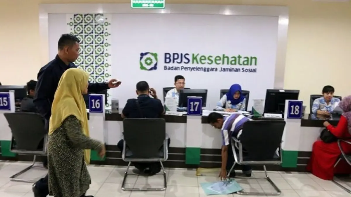 PBI BPJS Kesehatan menjadi sorotan. Pemerintah menyebut 155 juta warga masih menerima bantuan iuran dan diminta rutin mengecek status kepesertaan.(Gemini AI)