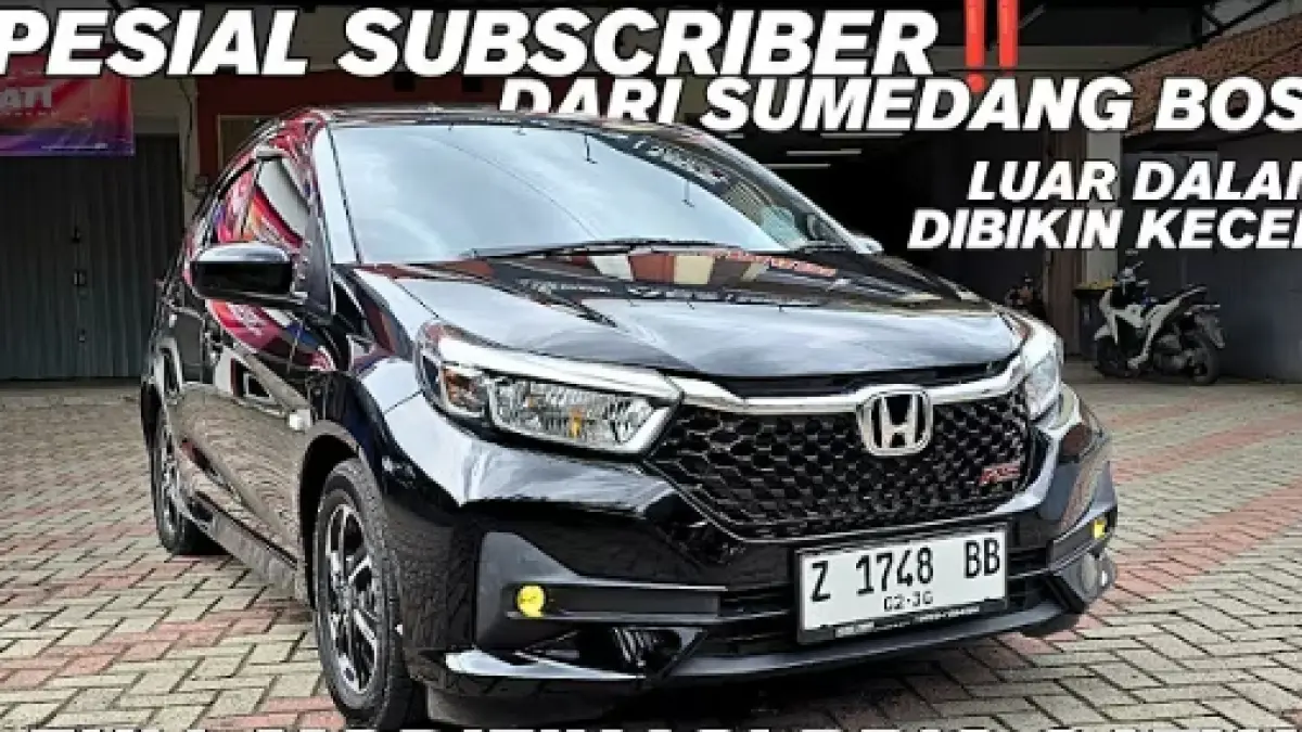Modifikasi Honda Brio Satya dari Sumedang jadi look RS 2026 dengan grille, lampu, spoiler, rear diffuser, side skirt, dan head unit Android.
