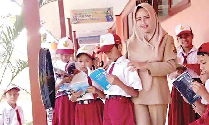 keseriusan-evi-triningsih-menekuni-dunia-literasi