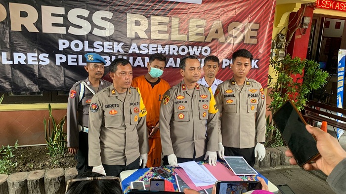 TERGODA: MI, 28, warga Desa Sawotratap, Gedangan, Sidoarjo, diamankan polisi setelah membawa pulang paket ojol yang seharusnya ia antar ke pemiliknya. (IST)