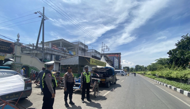Cuaca cerah berawan di sejumlah kawasan Surabaya (IST).