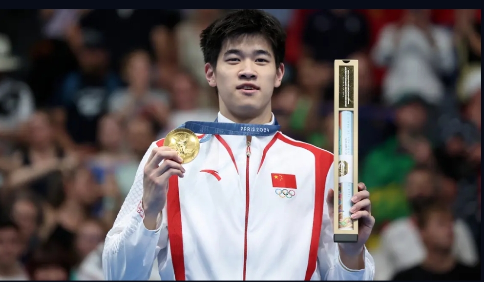 Momen ajaib Phan Zhanle raih medali emas dan pecahkan rekor dunia.