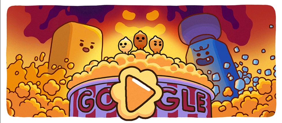 Banner google doodle yang menampilkan permainan bertema popcorn.
