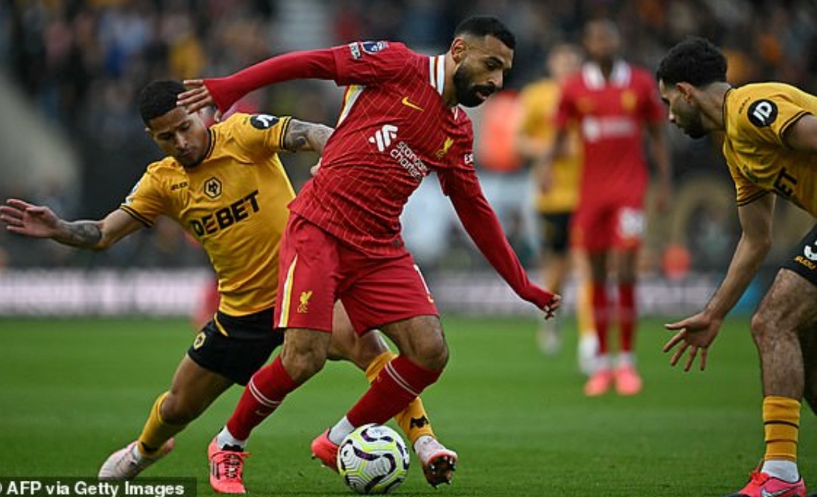 Mo Salah cetak gol kemenangan Liverpool atas Wolves.