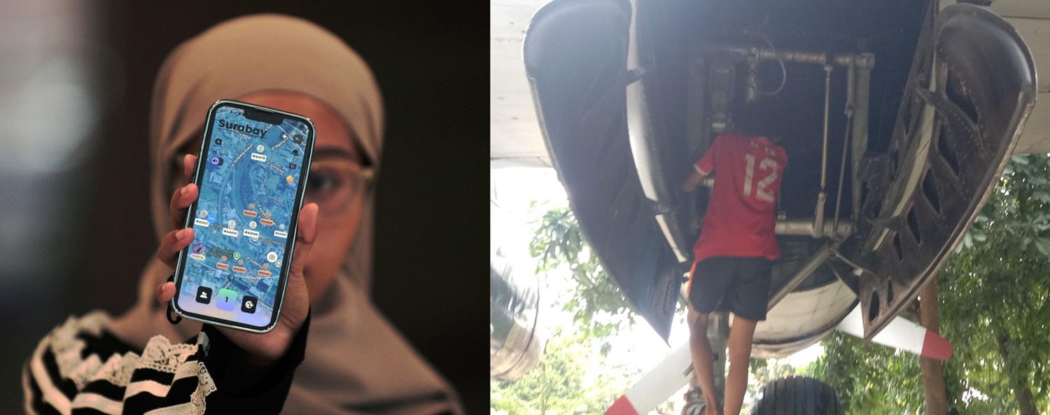 TREN: Aplikasi Jagat yang belakangan viral. Sejumlah warga Surabaya tengah mencari koin di Taman Prestasi, Surabaya.