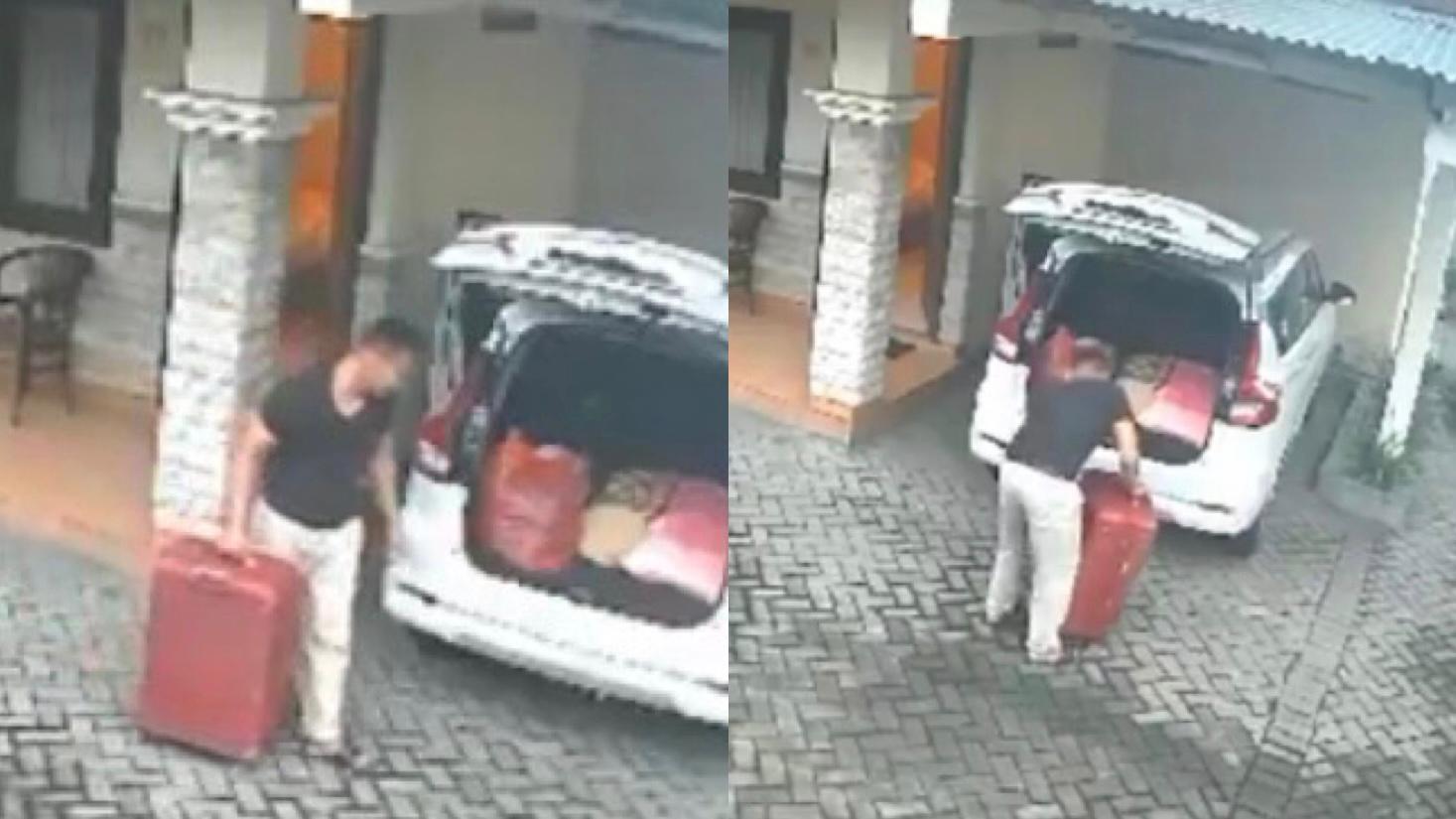 Tangkapan layar CCTV tersangka membawa koper merah berisi jasad korban yang telah dimutilasi.
