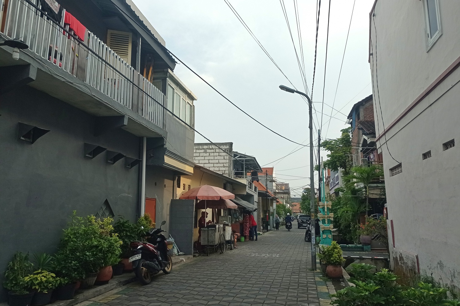 Ilustrasi kawasan perkampungan dan rumah warga.
