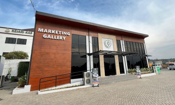 SEJUK: marketing gallery perumahan Neo Natura yang merupakan produk unggulan Graha Mukti Indah Group berlokasi di Jl. Raya Raci, Kecamatan Bangil, Kabupaten Pasuruan.
