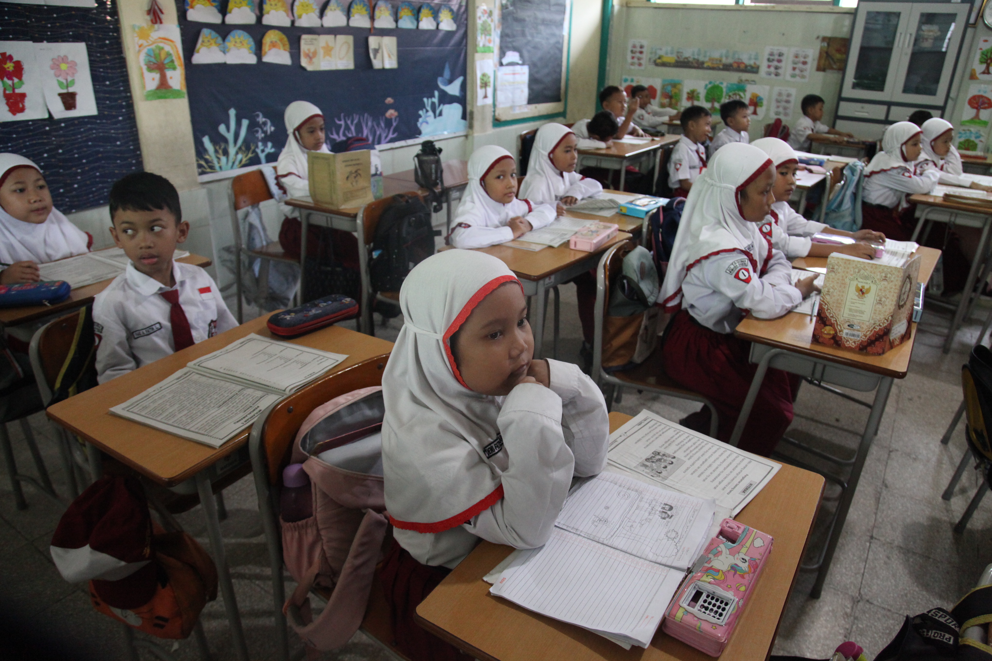 Ilustrasi pembelajaran siswa SD.