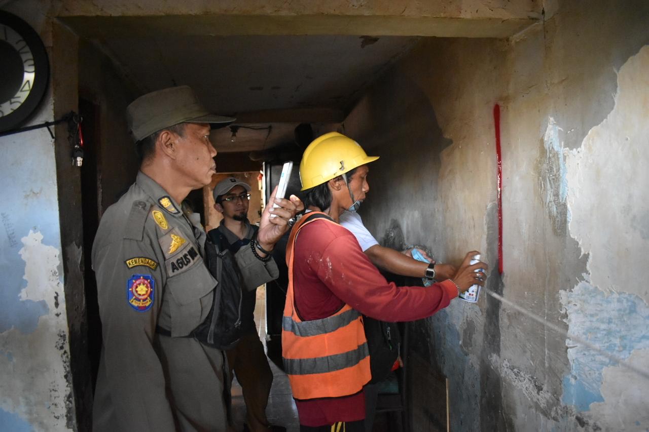 Panandaan bangunan di bantaran Sungai Kalianak yang akan diterbitkan.