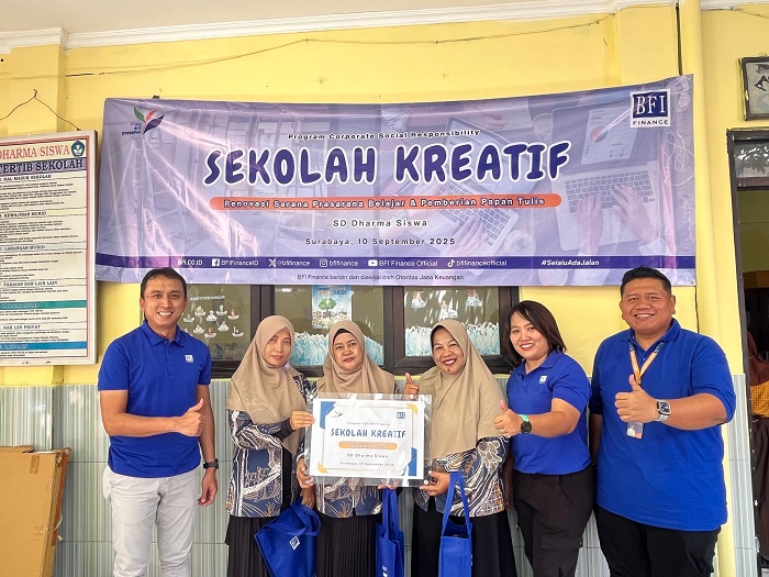 BERBAGI: BFI Finance serahkan bantuan untuk perbaikan fasilitas sekolah di SD Dharma Siswa, yang berlokasi di Kenjeran, Surabaya.